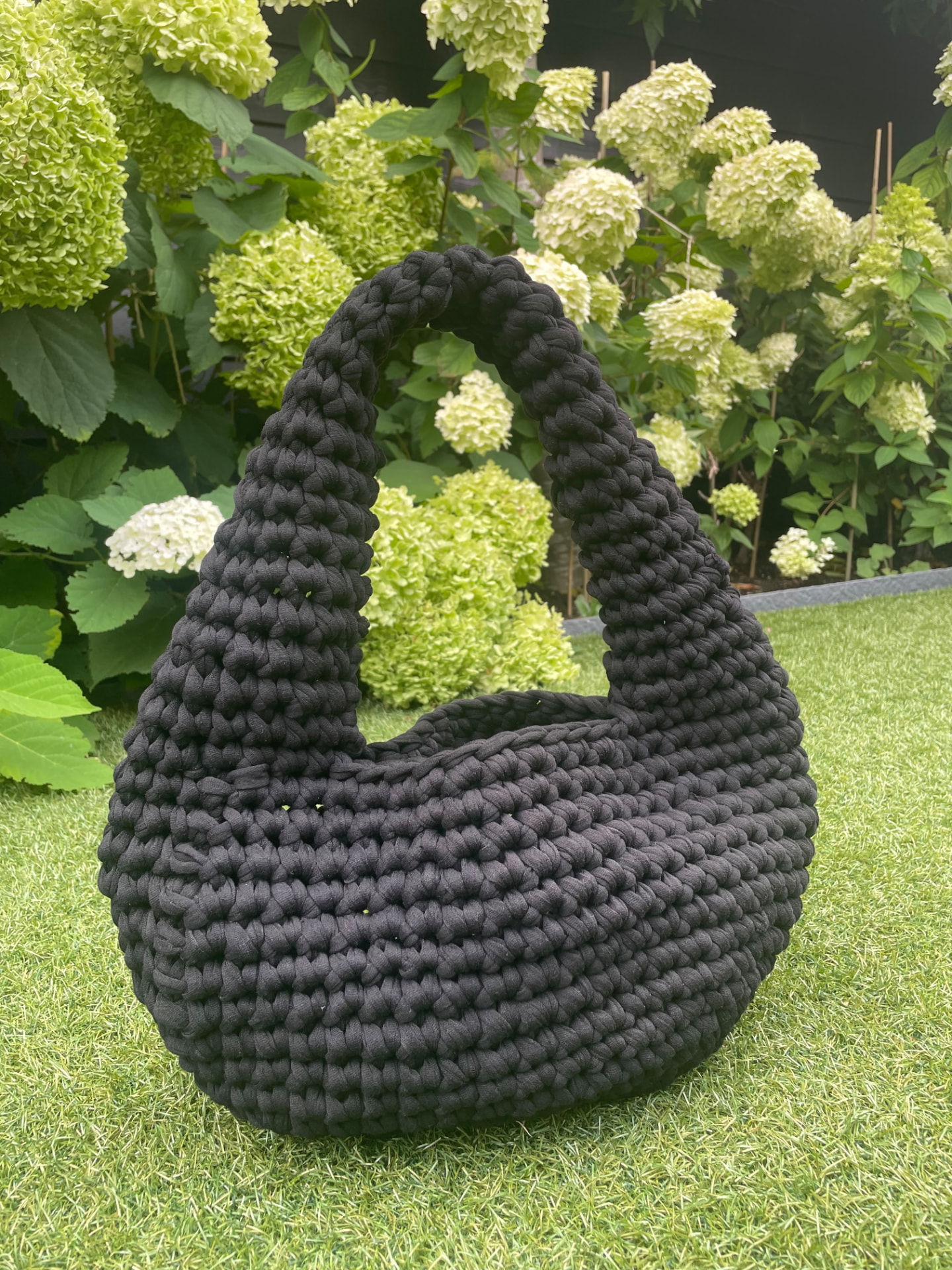 Crescent Hobo - black crocheted crescent-shaped bag